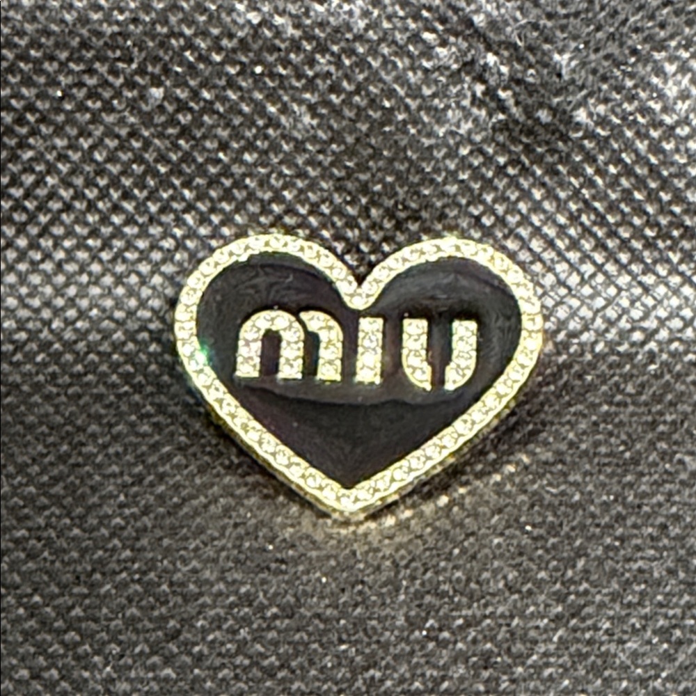 ✅ PRICE  IS FIRM ✅ Fashion Black and Gold Heart Logo Brooch.